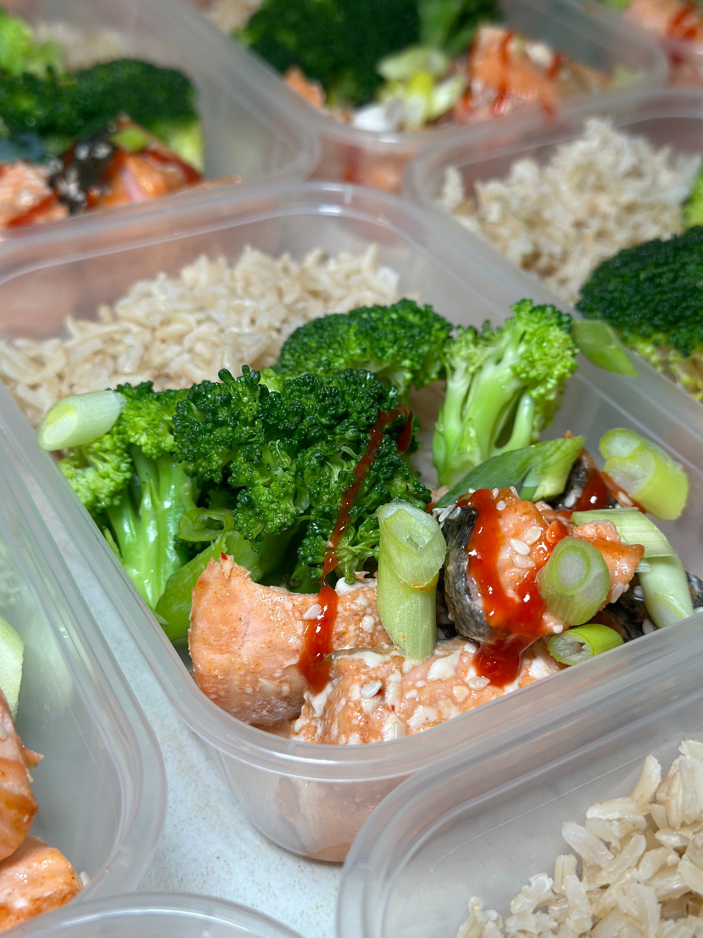 F1 Sriracha Honey Salmon Bites with Wholegrain Rice & Broccoli. 520 calories: 40GC/26GF/31GP